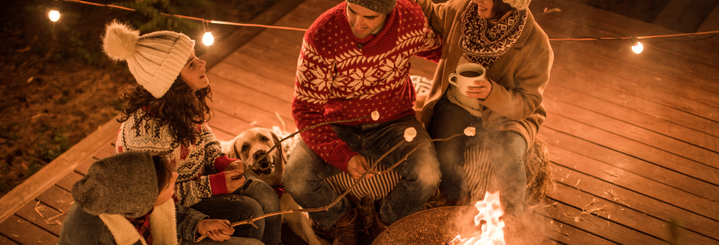 Family bonfire with labrador.